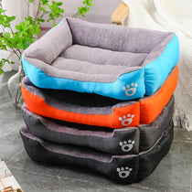Dog resting on soft square dog bed