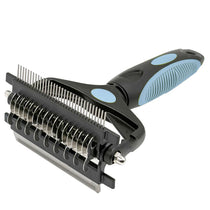 Pet grooming brush in blue