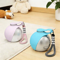 Portable dog water bottle on outdoor walk